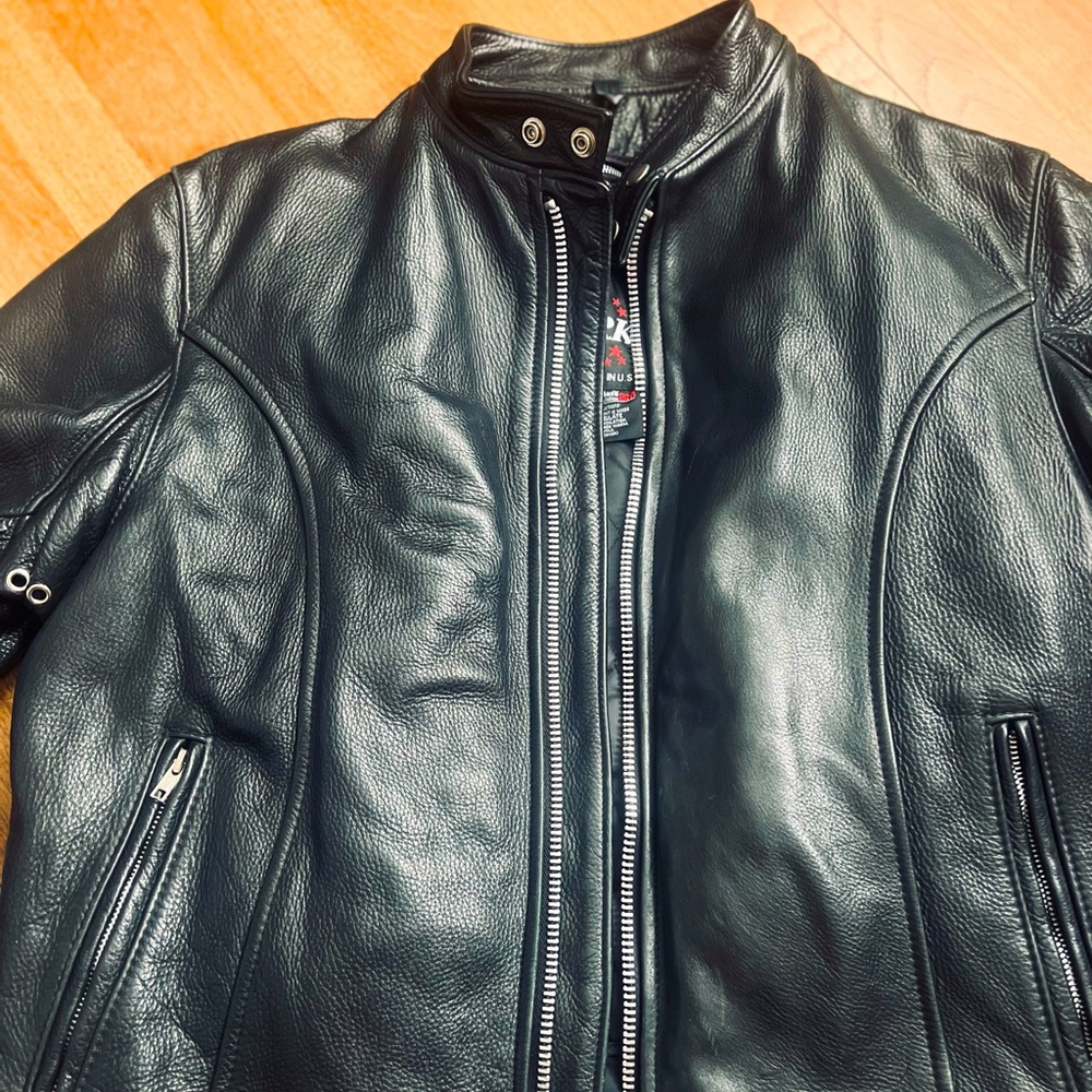 Amazing quality leather motorcycle jacket with beautiful details.